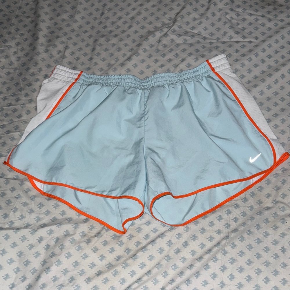 Nike Women's Sky Blue Athletic Shorts with Orange Trim